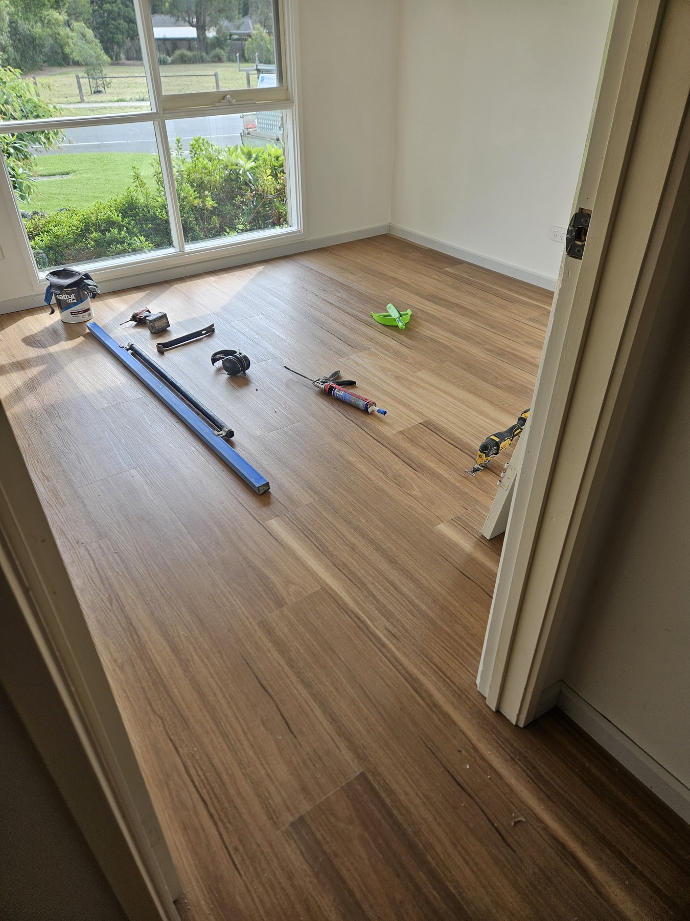 Timber flooring installation in progress.